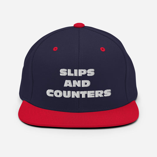 SLIPS AND COUNTERS Snapback Hat